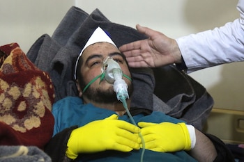 A spokesman for the Syria Civil Defence said 33 people, mostly women and children, were affected by the gas, which they suspect was chlorine (AFP)